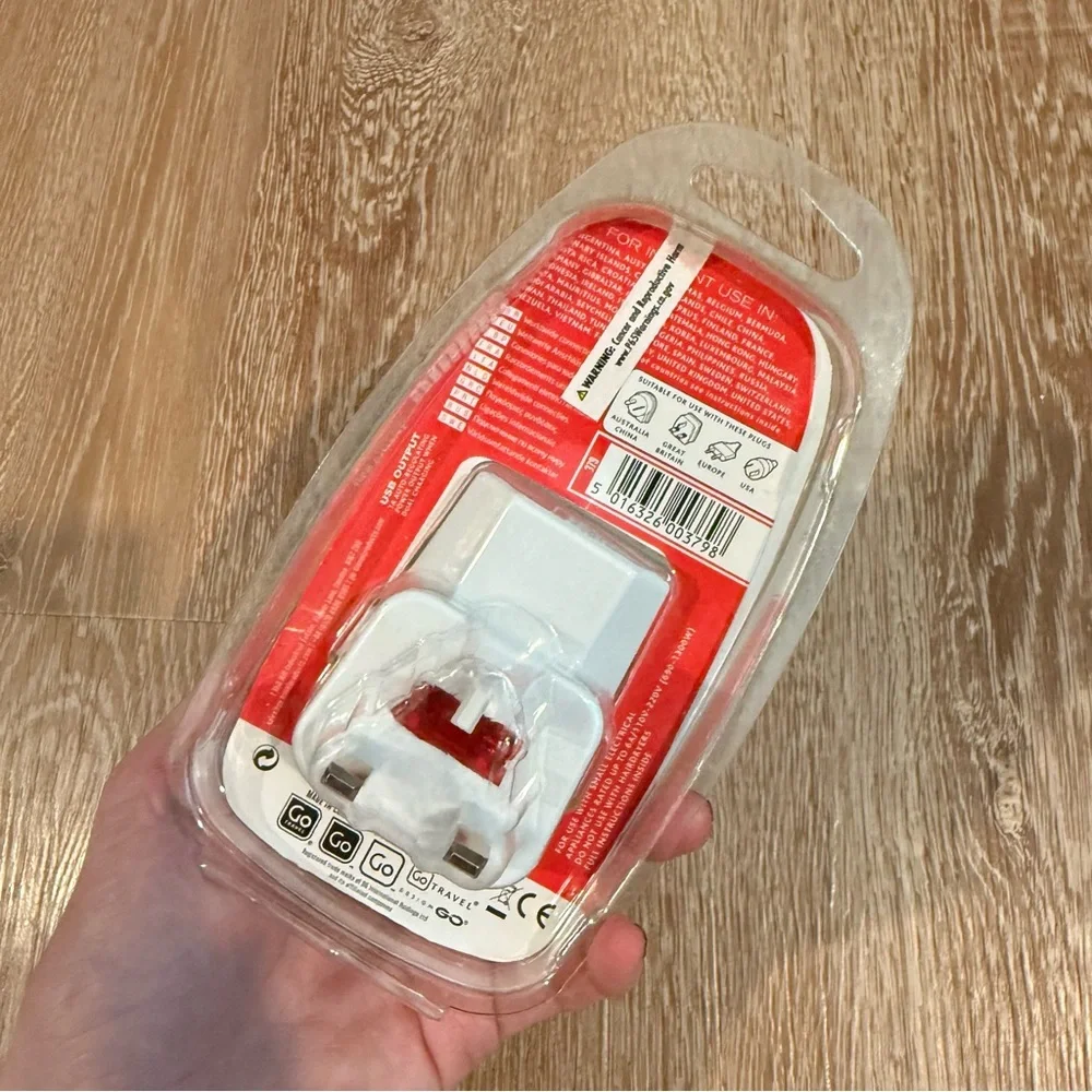 World Adaptor + USB Charger - White